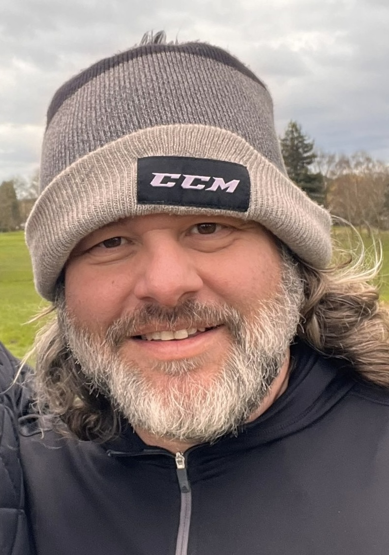 Ian on a golf course in Sweden