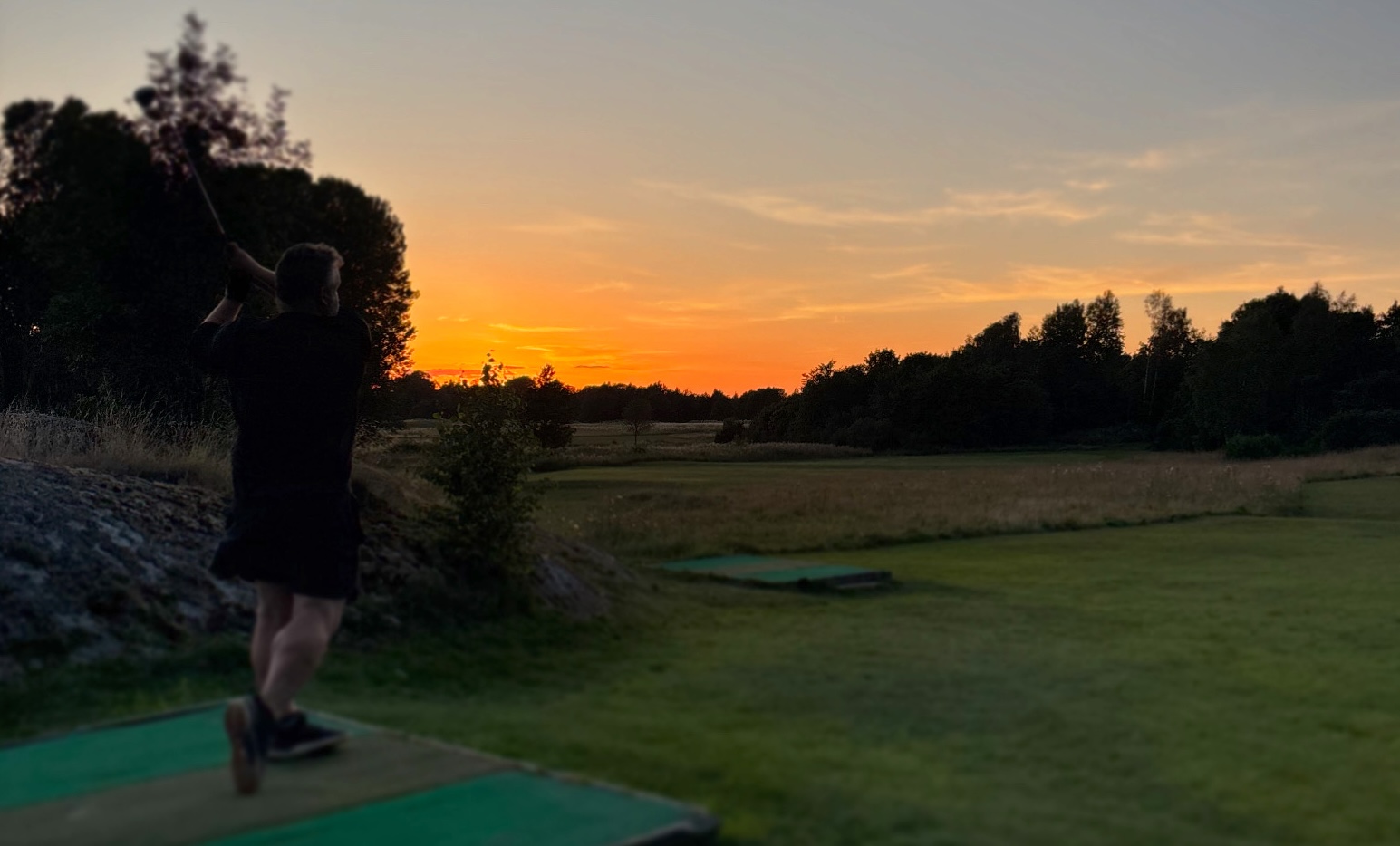 Golf at sunset in the Nordic landscape